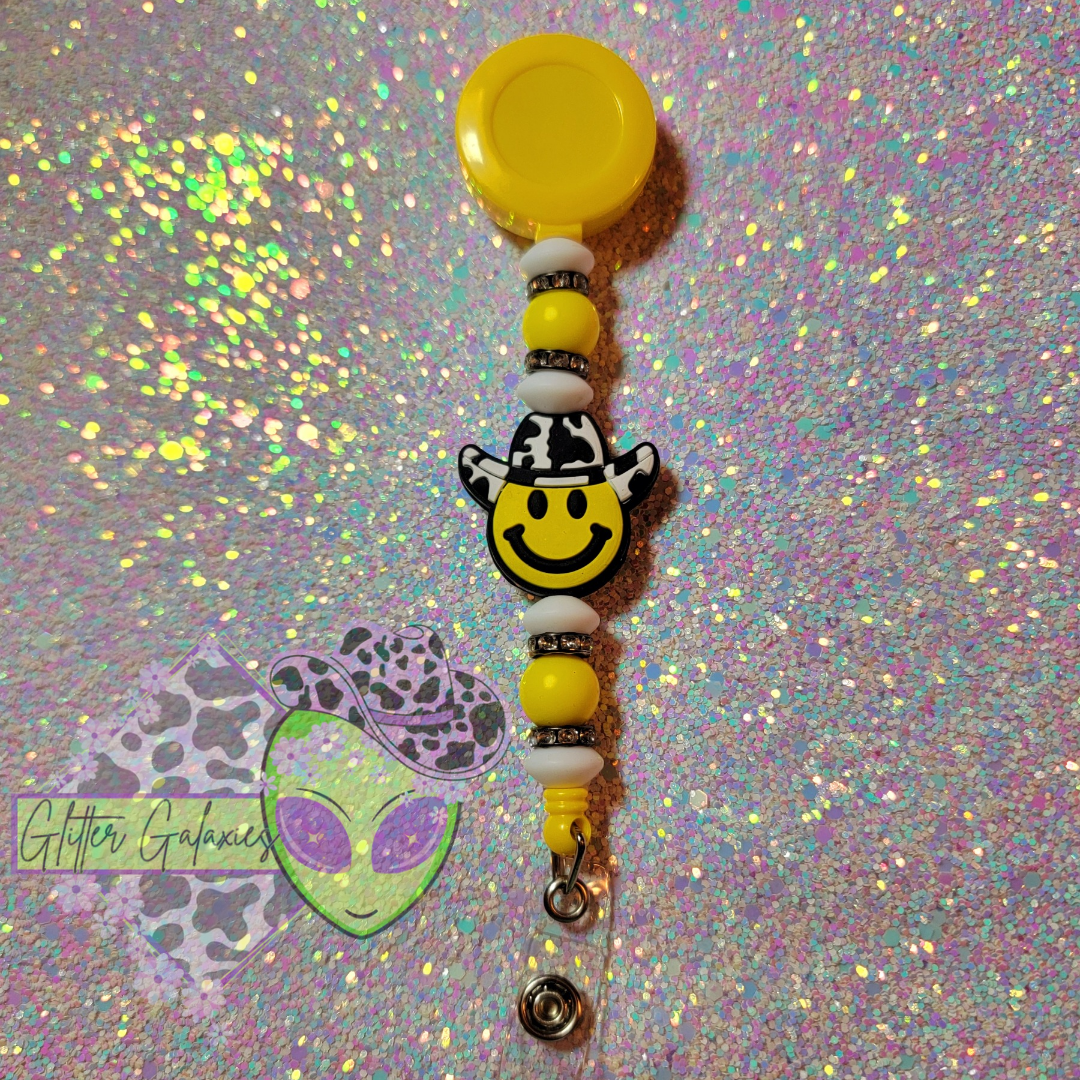 Yellow Cowgirl Smiley Badge Reel