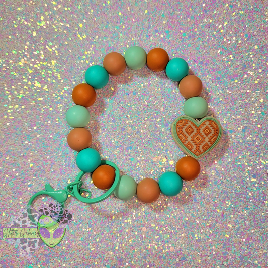 Orange and Turquoise Aztec Heart Wristlet