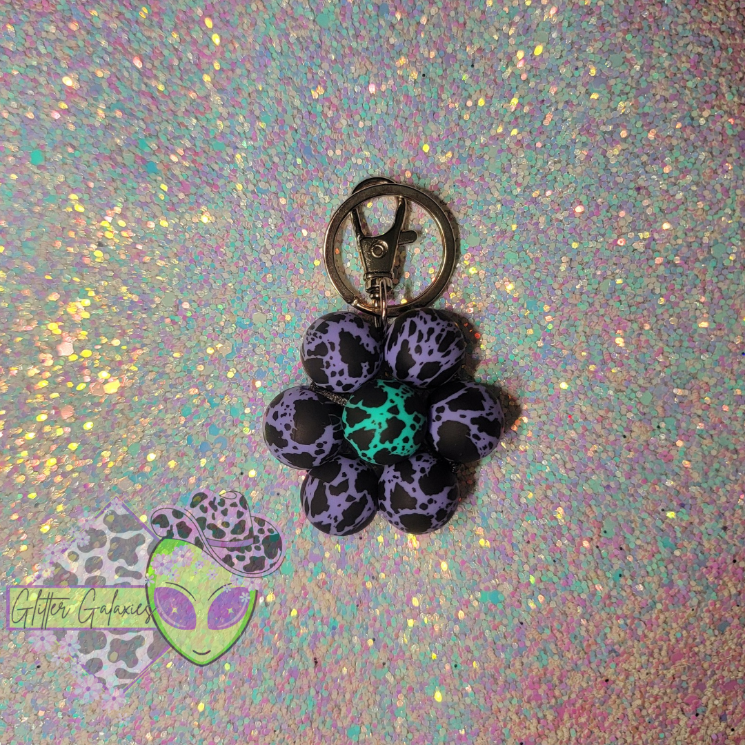 Purple Cowprint Daisy Keychain