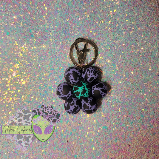 Purple Cowprint Daisy Keychain