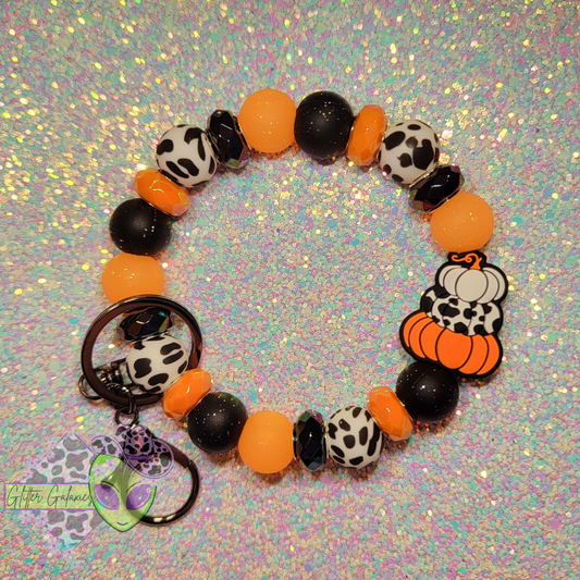 Cowprint Pumpkin Wristlet